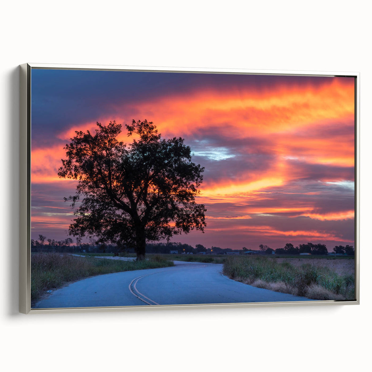Framed canvas featuring a vintage-style Oklahoma landscape with colorful skies and black foreground.