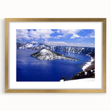 Extra large wall art depicting Crater Lake, Oregon, in vibrant blue tones on a textured canvas, framed in gold.
