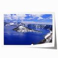 Rolled print of Crater Lake, Oregon, in muted blue and green tones, ideal for dining room wall art.