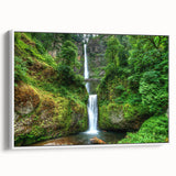 Vintage poster art of Multnomah Falls, Oregon on a large framed canvas, featuring vibrant greens and blues.