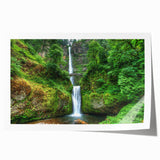 Multnomah Falls depicted in muted green and blue tones on a large rolled canvas, suitable for dining room wall art.