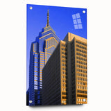 Acrylic print of a large abstract depiction of the Philadelphia skyline in muted blue and gray tones.