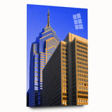 Acrylic print of a large abstract depiction of the Philadelphia skyline in muted blue and grey tones.
