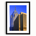 Abstract art print of Philadelphia skyline in vibrant colors on a large, textured canvas, ideal for living room decor.