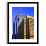 Abstract art print of Philadelphia skyline in vibrant colors on a large, textured canvas, ideal for living room decor.