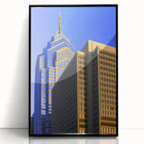 Large abstract wall art of Philadelphia skyline in muted gray and blue tones on a black-framed acrylic print.