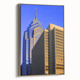 Framed canvas wall art of Philadelphia landscape in vintage poster style, featuring black and gold tones.