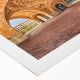 Art deco poster of Pittsburgh skyline in muted gold and blue tones on rolled canvas, suitable for dining room wall art.