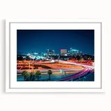 Abstract art print of Phoenix Valley in muted earth tones on a framed white mat, ideal for dining room decor.