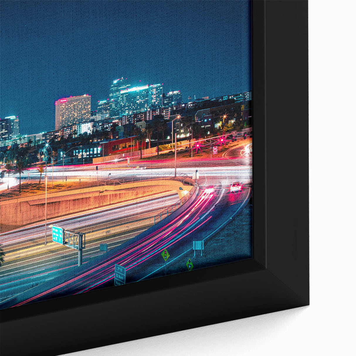 Close-up of a framed canvas featuring a textured depiction of the Phoenix valley in black with vibrant, colorful accents.