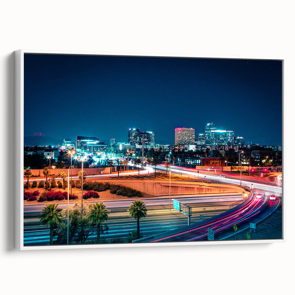 Vintage poster art of Phoenix Valley on a framed canvas, featuring colorful art with black borders.