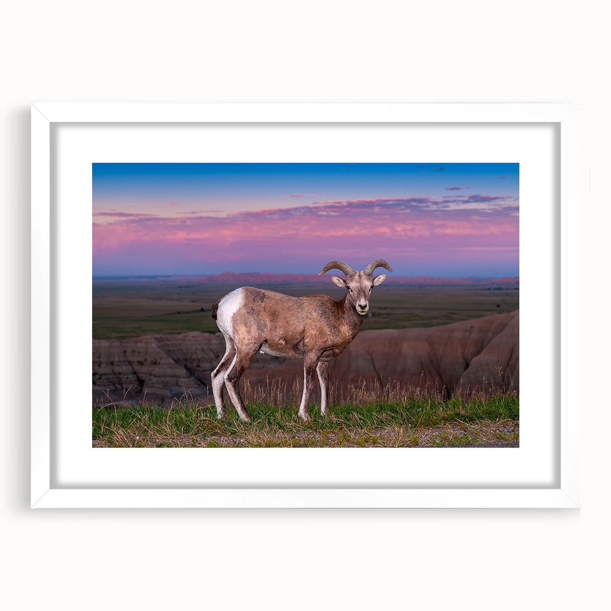 Abstract art print of South Dakota Badlands in muted earth tones on a framed white mat, ideal for dining room decor.