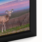 Close-up of textured black wall art depicting South Dakota Badlands on a framed canvas, featuring vibrant colors.
