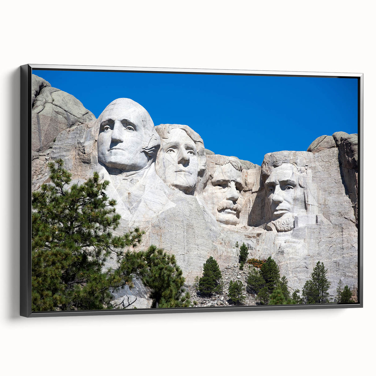 Black and white wall art of Mt. Rushmore on a framed canvas, ideal for bedroom landscape decor.