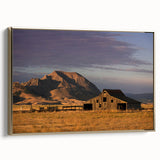 Framed canvas of a South Dakota landscape in vintage style with a black and gold color palette, ideal for bedroom wall art.