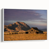 Vintage poster art of South Dakota scenery in colorful hues on a large framed canvas, ideal for living room decor.