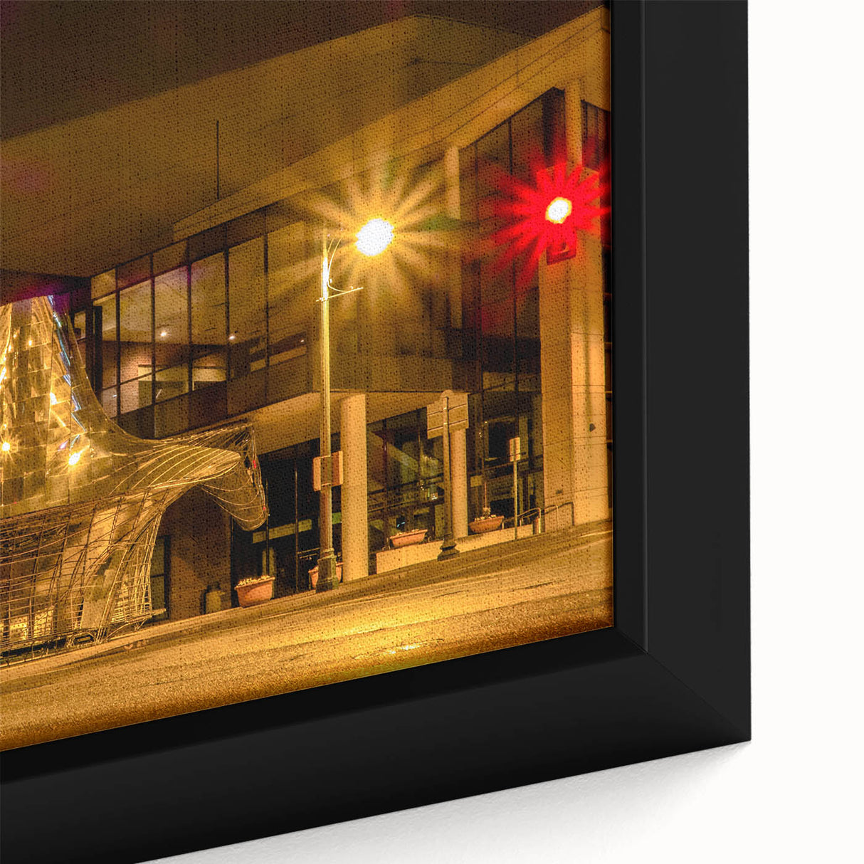 Close-up of a textured black wall art featuring a colorful Memphis, Tennessee skyline on a framed canvas.
