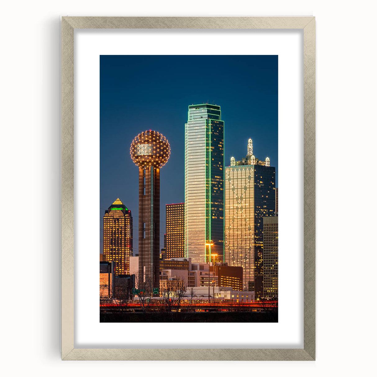 Textured abstract art print of Dallas skyline in muted gray and silver tones, framed with a silver mat.