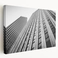 Large art depicting the Houston skyline in muted gray and blue tones on a stretched canvas, ideal for kitchen wall art.