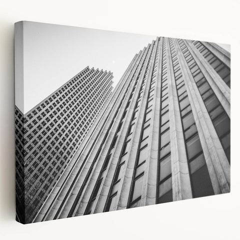 Large art depicting the Houston skyline in muted gray and blue tones on a stretched canvas, ideal for kitchen wall art.