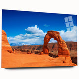 Large abstract wall art of Arches National Park in Utah on acrylic glass, featuring earthy red and orange tones.