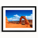 Colorful abstract art print of Arches National Park in vibrant red and orange hues on a large framed canvas.