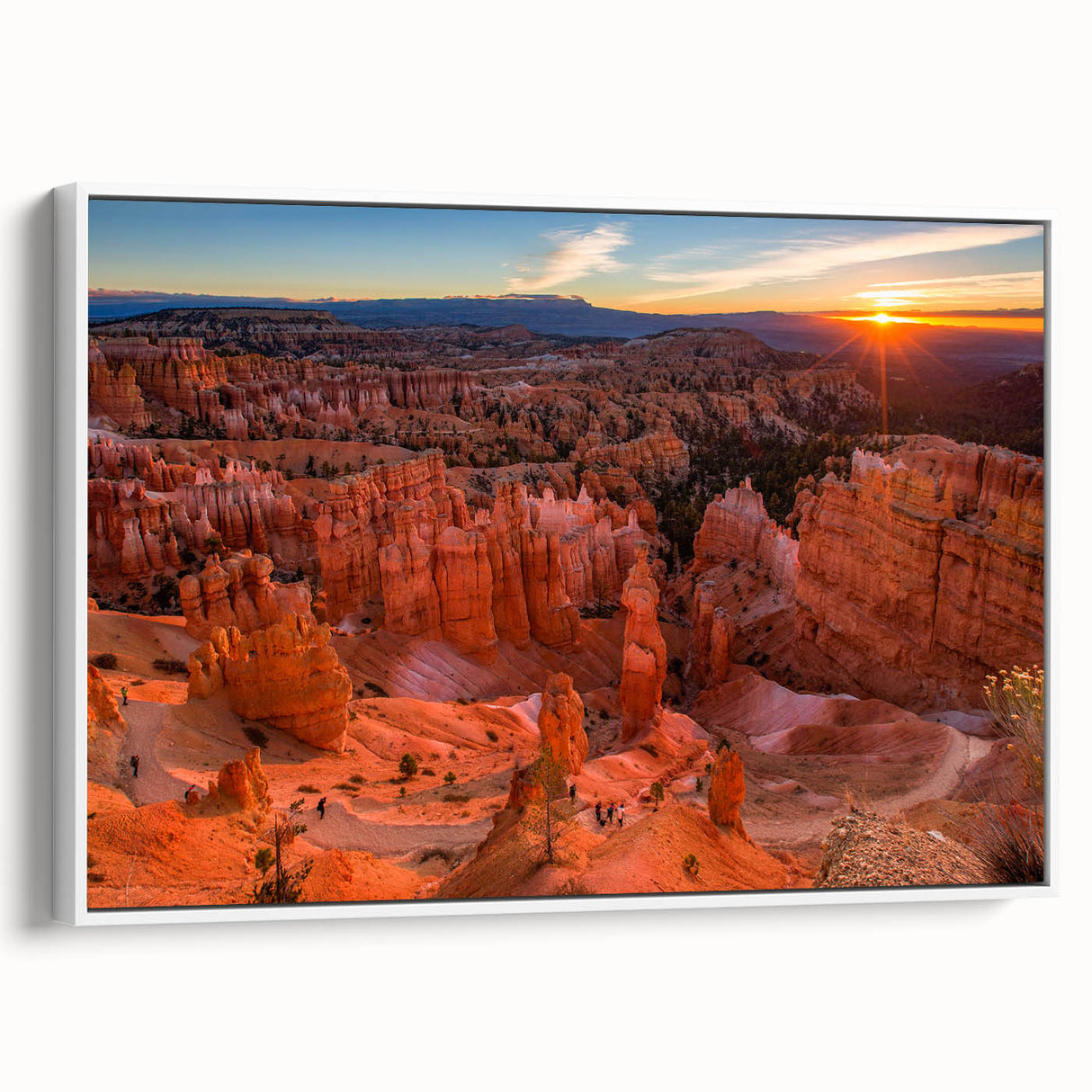 Vintage poster art of Bryce Canyon on a white framed canvas, featuring earthy red and orange tones.