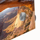 Large abstract wall art of Canyonlands in Utah with warm earth tones on acrylic glass, ideal for dining room ambiance.