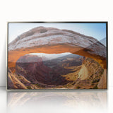 Mid-century modernist art depicting the Canyonlands in Utah, with earthy tones on a silver-framed acrylic print.