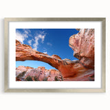 Textured art depicting Capitol Reef, Utah in abstract style with earthy tones on a silver-framed mat.