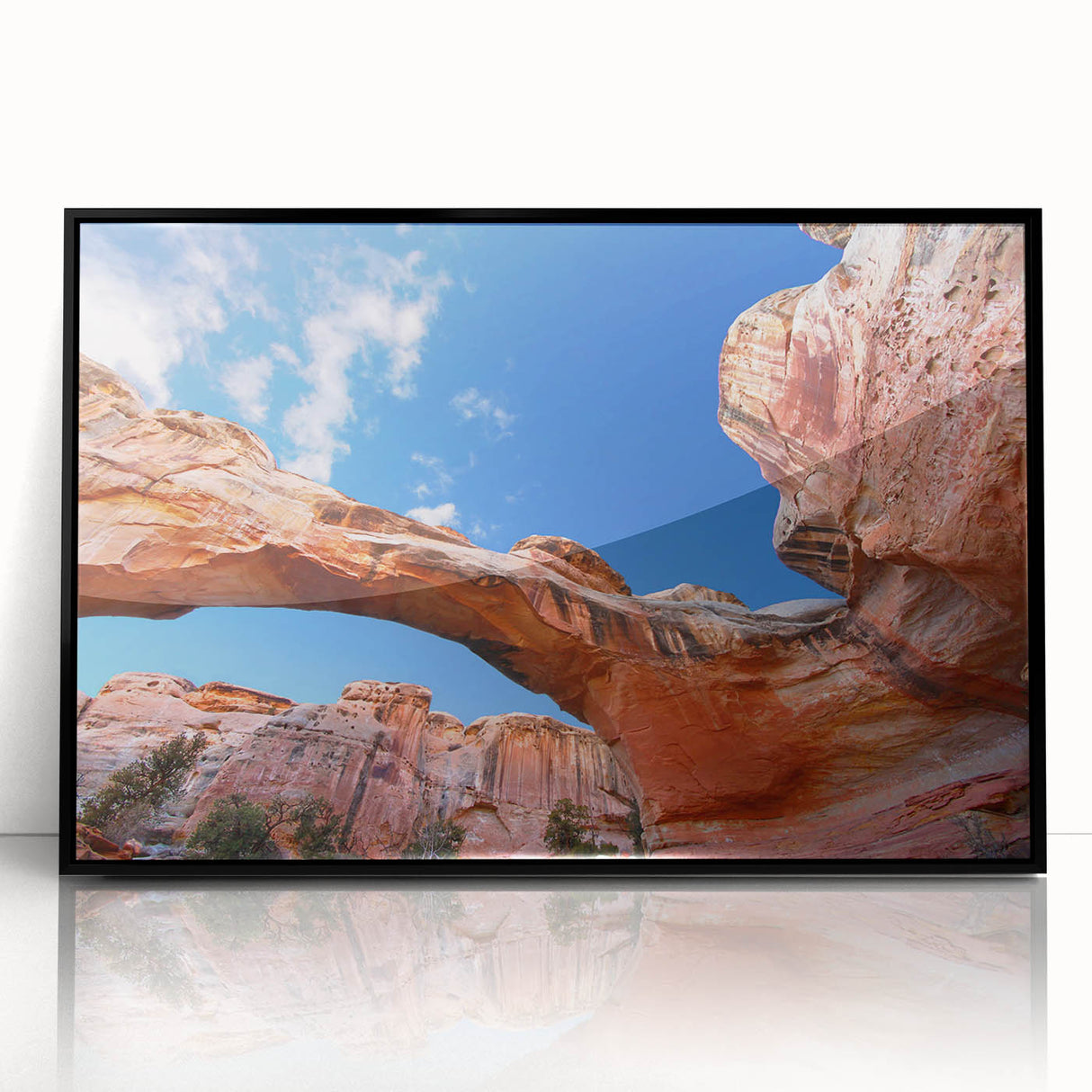 Large abstract wall art depicting Utah's Capitol Reef in muted earth tones on a black framed acrylic.