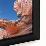 Close-up of a textured black wall art depicting Capitol Reef, Utah, with vibrant colors on a framed canvas.