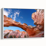 Vintage poster art of Capitol Reef, Utah, featuring vibrant reds and oranges on a white framed canvas.