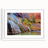 Abstract art print depicting Utah's Zion scenery in muted earth tones on a framed white mat.