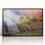 Large abstract wall art depicting Zion National Park in muted earth tones on a black framed acrylic.