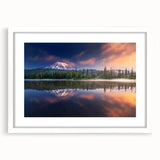 Abstract art print of Mount Rainier in muted blue and green tones on a framed white mat, suitable for dining room decor.