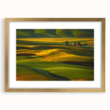 Extra large abstract art print of Palouse, Washington, in a gold frame, featuring textured, rolling hills in earth tones.