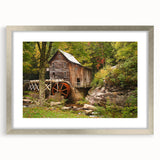 Textured art print depicting an abstract West Virginia landscape in muted earth tones, framed in silver.