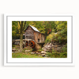 Abstract art print depicting the West Virginia landscape in muted green and blue tones, framed with a white mat.