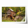 Rolled print of West Virginia scenery with lush green landscapes and floral elements.