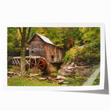 Rolled print of West Virginia scenery with lush green landscapes and floral elements.