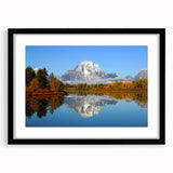 Colorful abstract art print of Wyoming's Grand Tetons in vibrant hues on a large framed canvas.