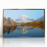 Large acrylic print featuring the Grand Tetons under a clear sky, framed in gold, ideal for modern art wall decor.