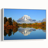 Vintage poster art of Grand Tetons with vibrant colors on a framed canvas, ideal for living room decor.