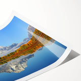 Extra large wall art depicting the Grand Tetons in a line art style with subtle floral elements, printed on rolled canvas.