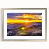 Textured art print of Yellowstone landscape in muted earth tones, framed in silver, ideal for bedroom art.