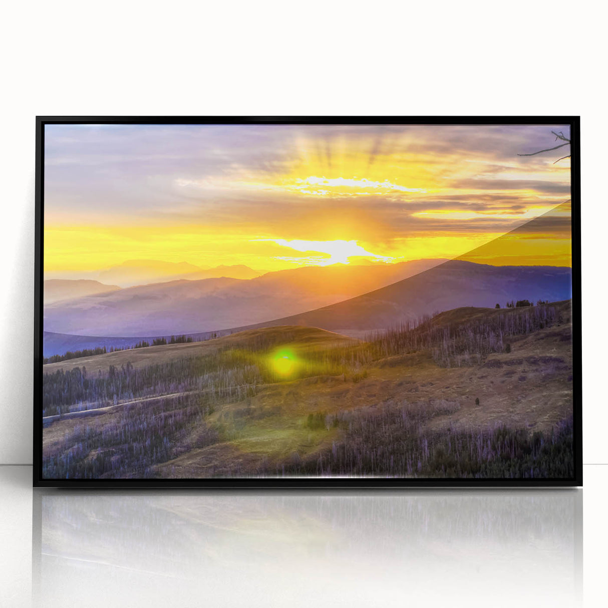 Large abstract wall art of Yellowstone scenery in muted earth tones on acrylic, framed in black.