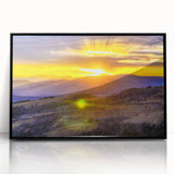 Large abstract wall art of Yellowstone scenery in muted earth tones on acrylic, framed in black.