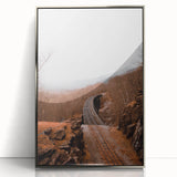 Mid-century modernist art depicting fall foliage in muted orange and brown tones on a framed acrylic print.