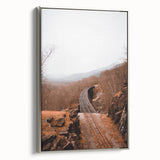 Framed canvas featuring a vintage-style landscape art painting of autumn trees in vibrant red and orange tones.